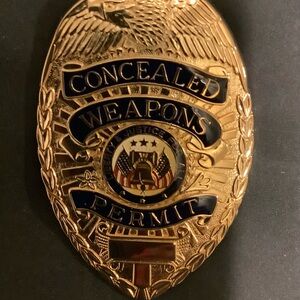Novelty concealed weapons badge